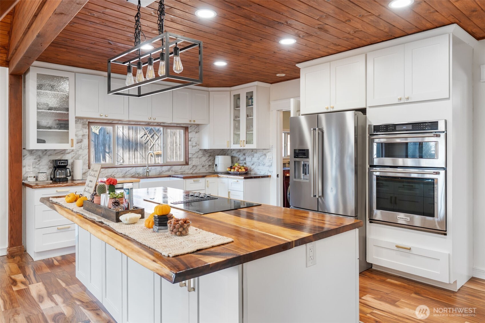 106 Pattee Road Chehalis, WA 98532 - Photo 13 of 40 a kitchen with stainless steel appliances a sink stove refrigerator and cabinets