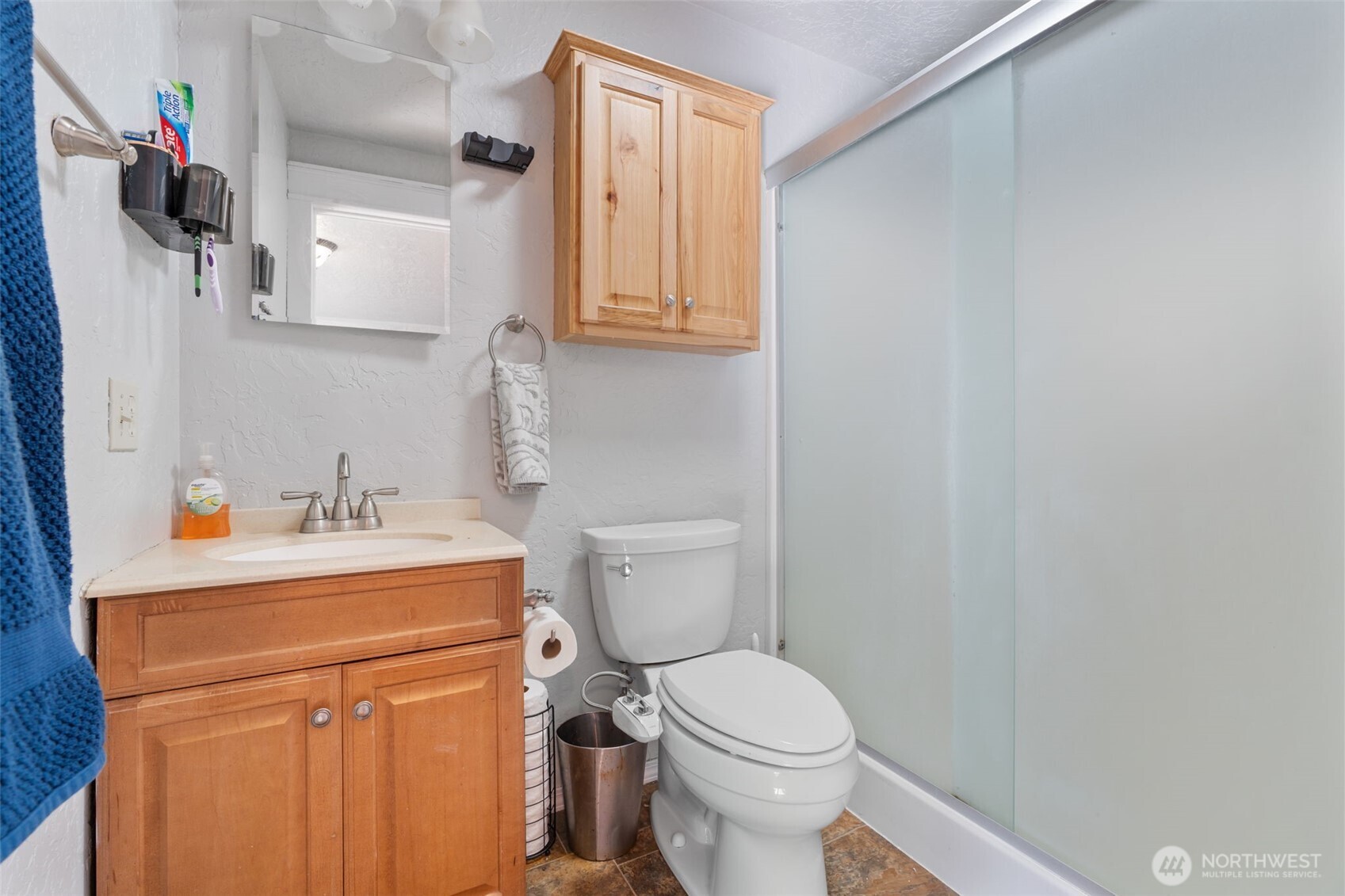 106 Pattee Road Chehalis, WA 98532 - Photo 23 of 40 a bathroom with a toilet a sink and a mirror