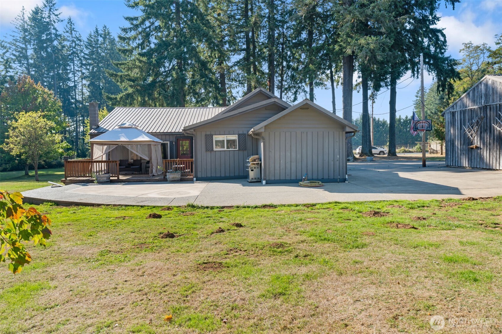 106 Pattee Road Chehalis, WA 98532 - Photo 26 of 40 a front view of a house with a yard table and chairs