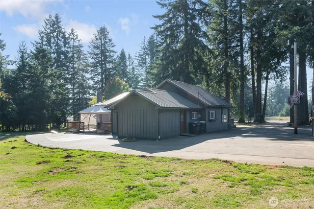 a view of a plants in front of house