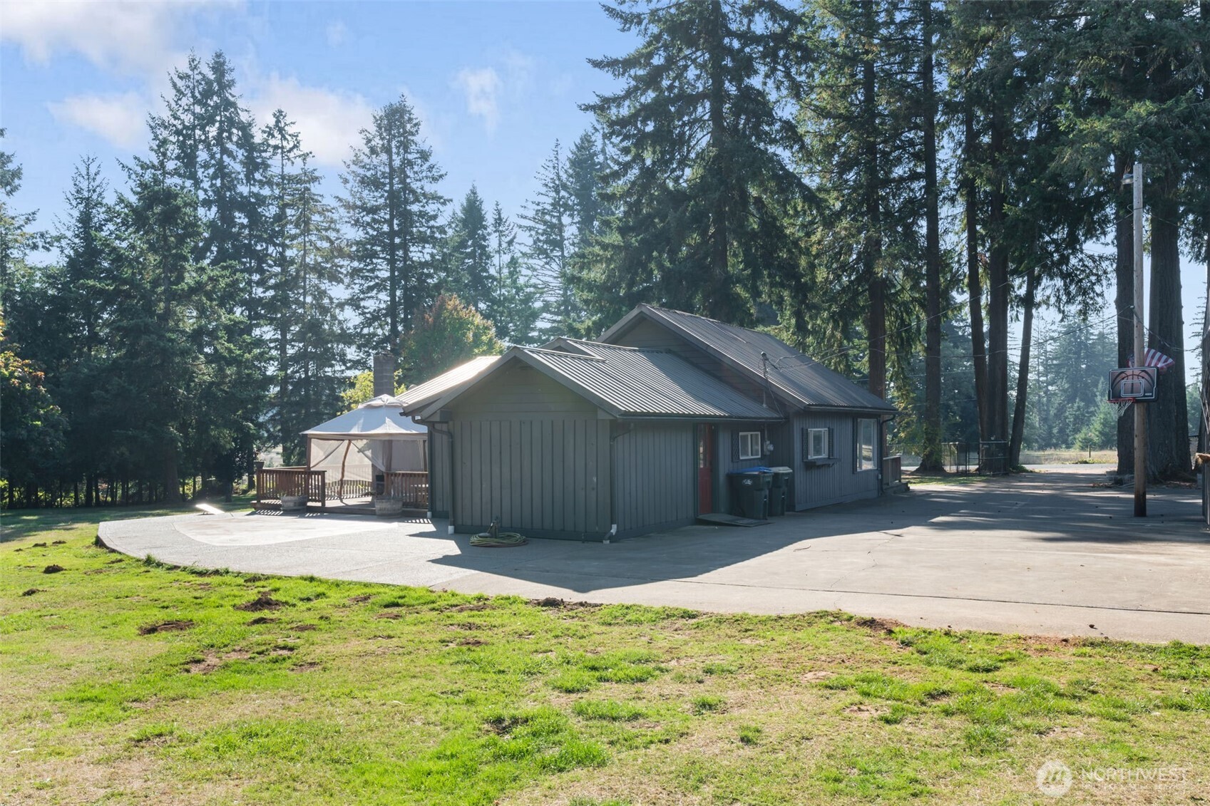106 Pattee Road Chehalis, WA 98532 - Photo 27 of 40 a backyard of a house with yard and tree