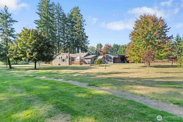 a view of a houses with a yard