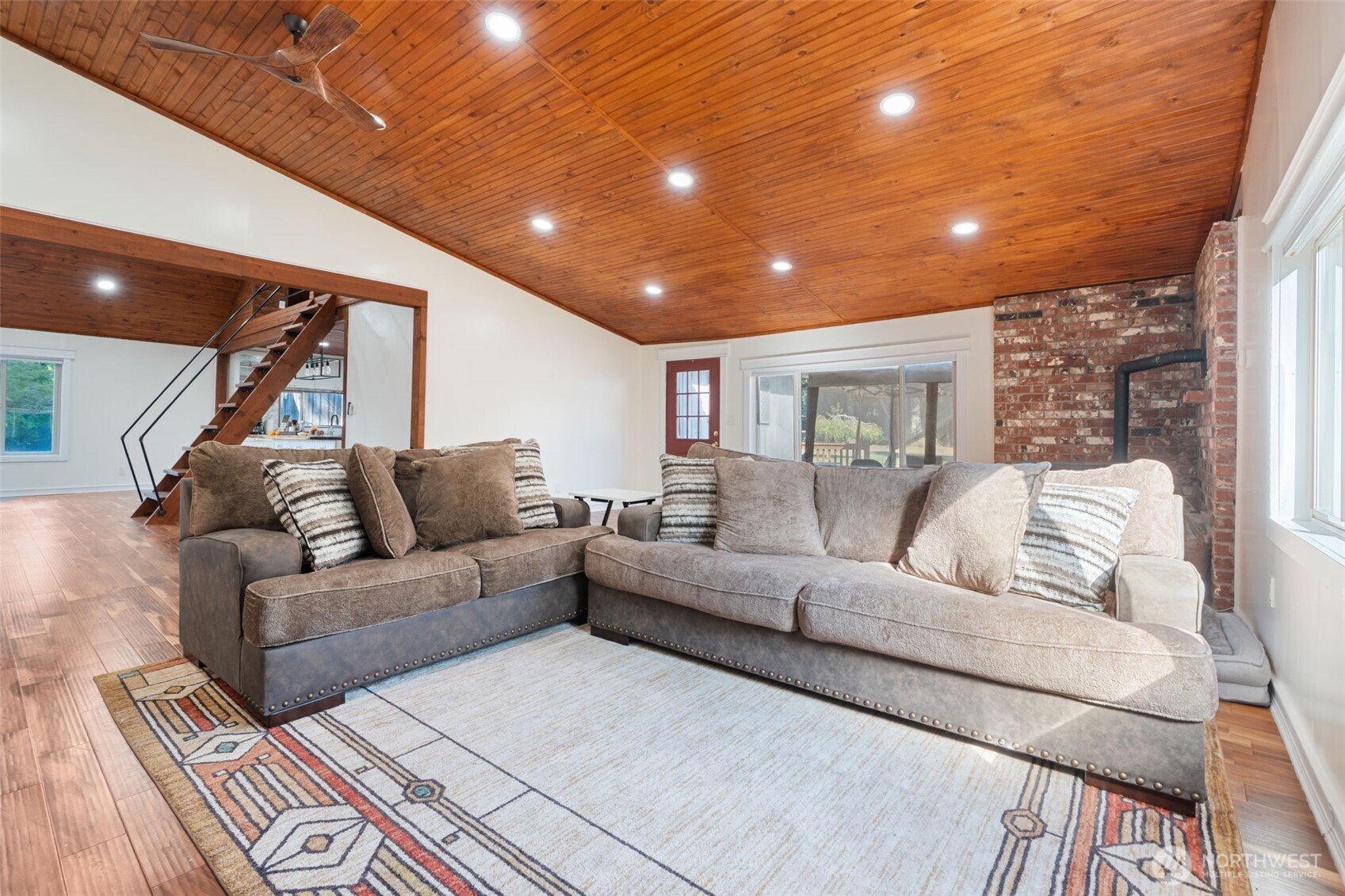 106 Pattee Road Chehalis, WA 98532 - Photo 9 of 40 a living room with furniture and a glass door