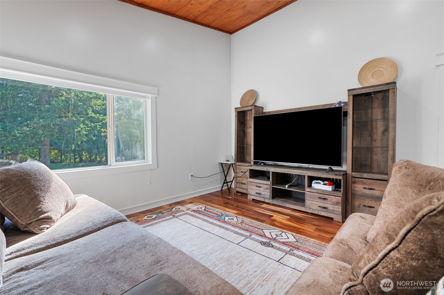 106 Pattee Road Chehalis, WA 98532 - Photo 10 of 40 a living room with furniture and a flat screen tv