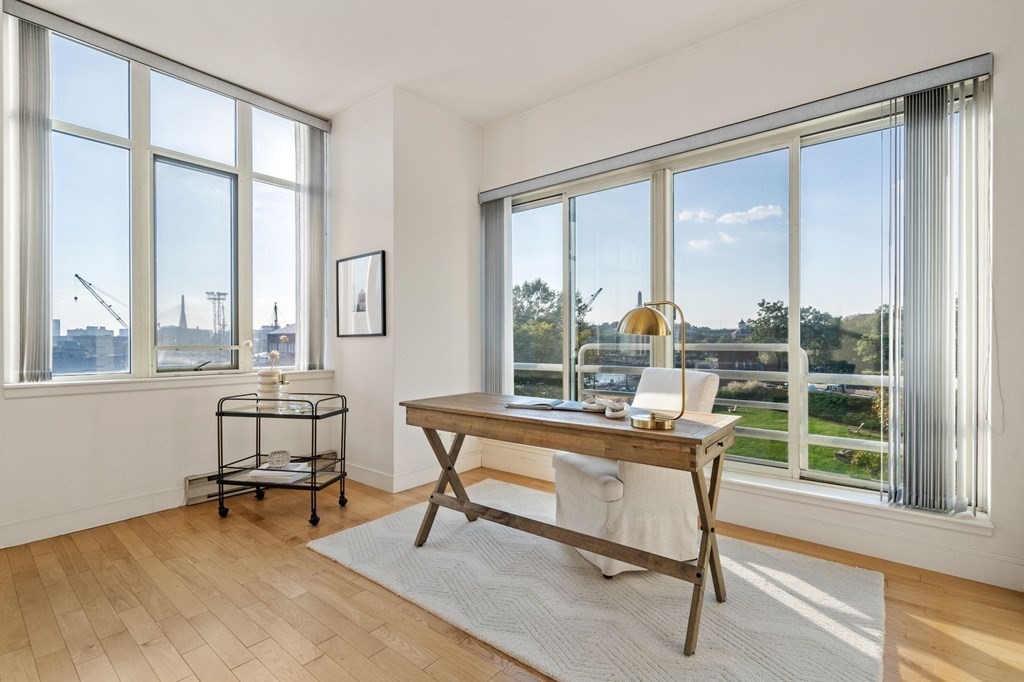 197 8th Street, Unit 330 Boston, MA 02129 - Photo 4 of 39 a view of a workspace with a window