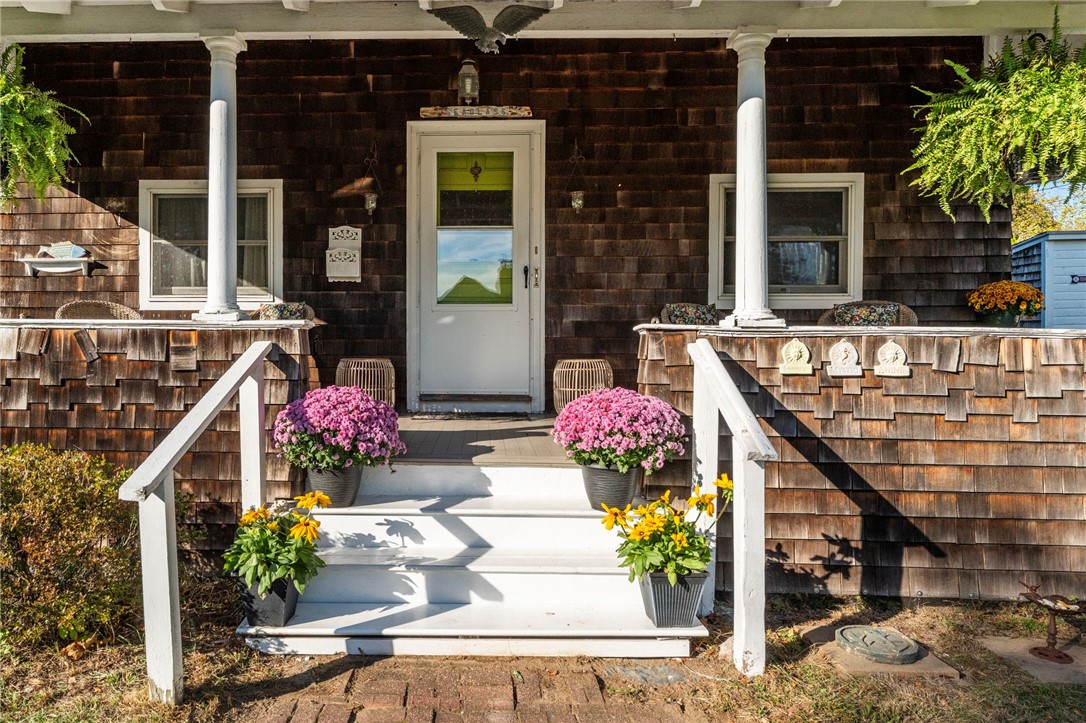 65 Coronado Street Jamestown, RI 02835 - Photo 3 of 42 Think of the history on this front porch!