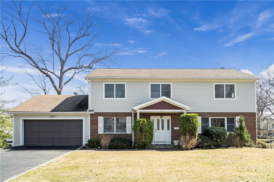 40 Franklin Avenue Rye, NY 10580 - Photo 1 of 1 a front view of a house with a yard