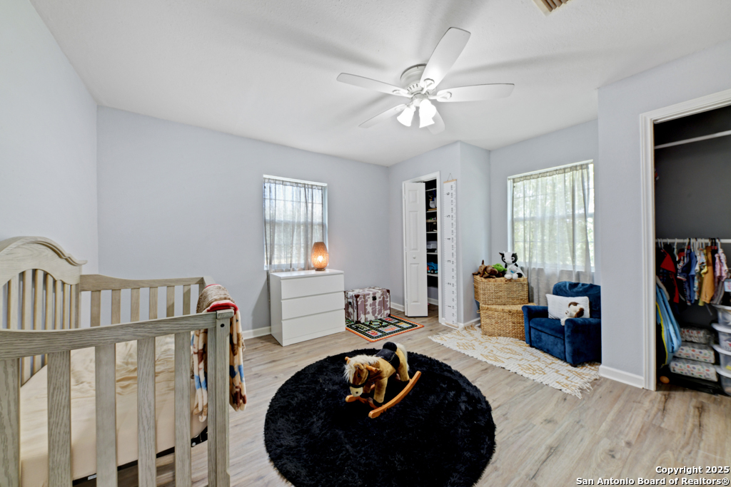 1510 Timmermann Road Seguin, TX 78155 - Photo 17 of 32 a living room with furniture and a window