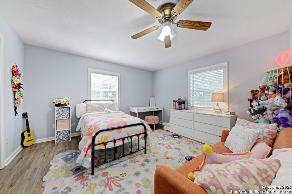 1510 Timmermann Road Seguin, TX 78155 - Photo 20 of 32 a bedroom with furniture and a window