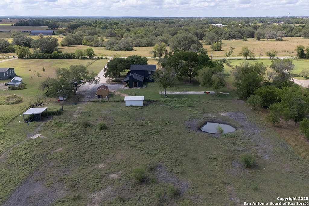 1510 Timmermann Road Seguin, TX 78155 - Photo 30 of 32 an aerial view of a house with yard