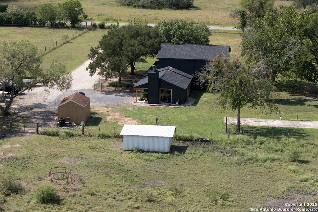 1510 Timmermann Road Seguin, TX 78155 - Photo 31 of 32 an aerial view of a house with a yard and lake view