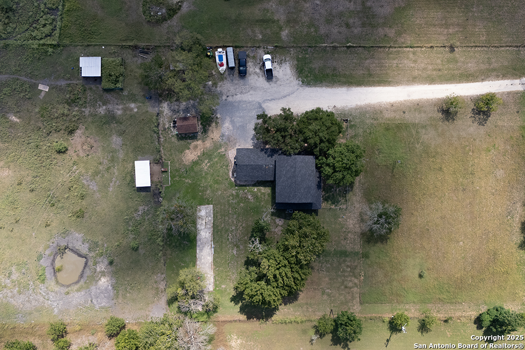 1510 Timmermann Road Seguin, TX 78155 - Photo 32 of 32 an aerial view of residential house with outdoor space
