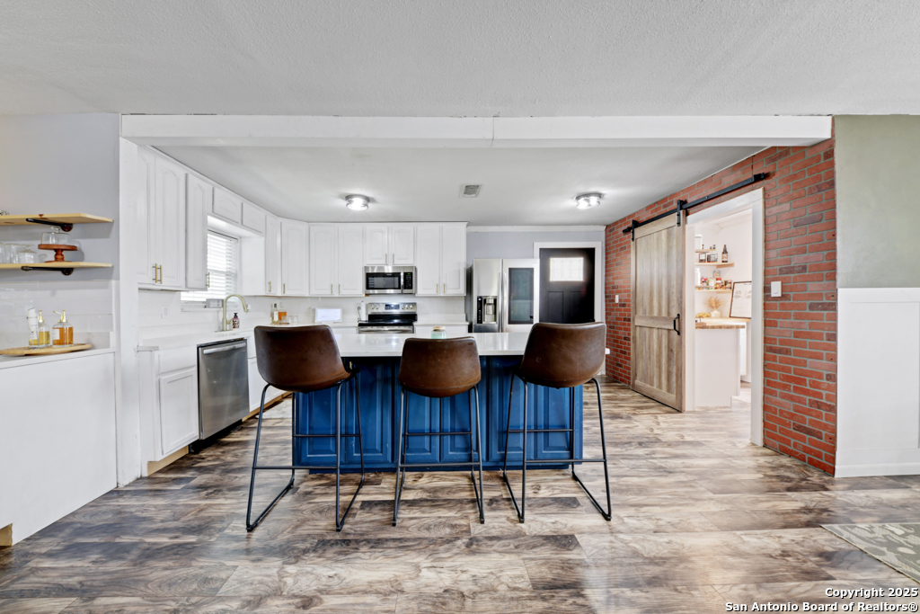 1510 Timmermann Road Seguin, TX 78155 - Photo 10 of 32 a view of a dining room with furniture