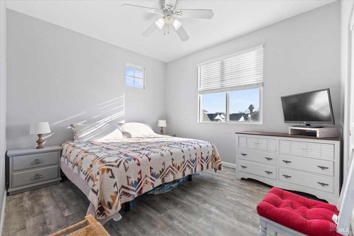 2067 San Miguel Avenue Santa Rosa, CA 95403 - Photo 22 of 38 a bedroom with a bed and a flat screen tv