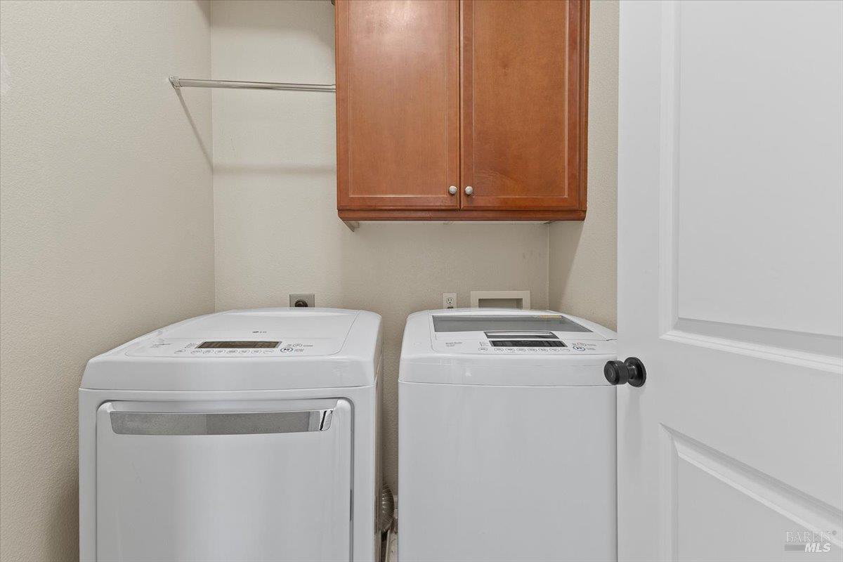 2067 San Miguel Avenue Santa Rosa, CA 95403 - Photo 25 of 38 a utility room with dryer and washer