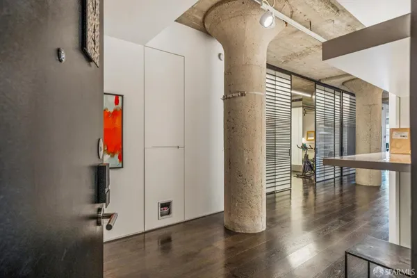 a view of a hallway with staircase