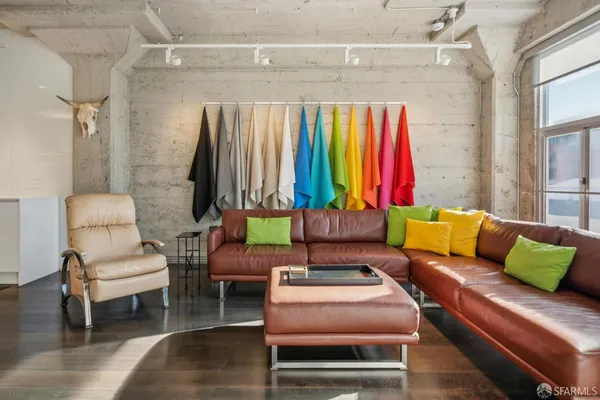 a living room with a couch and a large window
