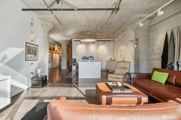 a workspace with furniture and wooden floor