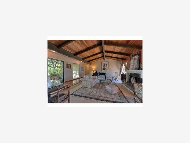 19580 Montevina Road Los Gatos, CA 95033 - Photo 3 of 9 a picture of a living room with a sink and a mirror