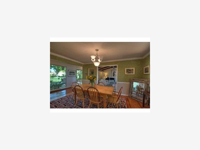 19580 Montevina Road Los Gatos, CA 95033 - Photo 4 of 9 a picture of a living room with a table and chairs
