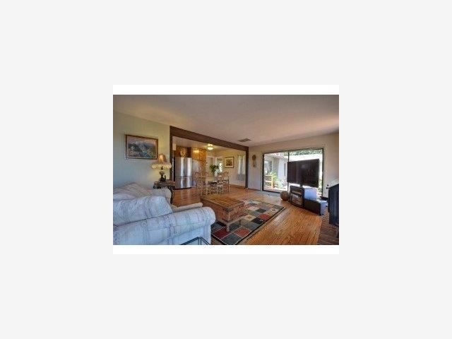 19580 Montevina Road Los Gatos, CA 95033 - Photo 5 of 9 a living room with furniture and a fireplace