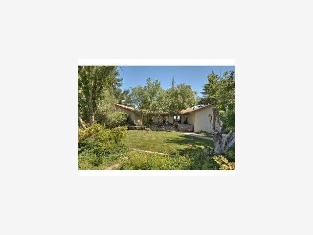 19580 Montevina Road Los Gatos, CA 95033 - Photo 8 of 9 a black and white photo of a living room