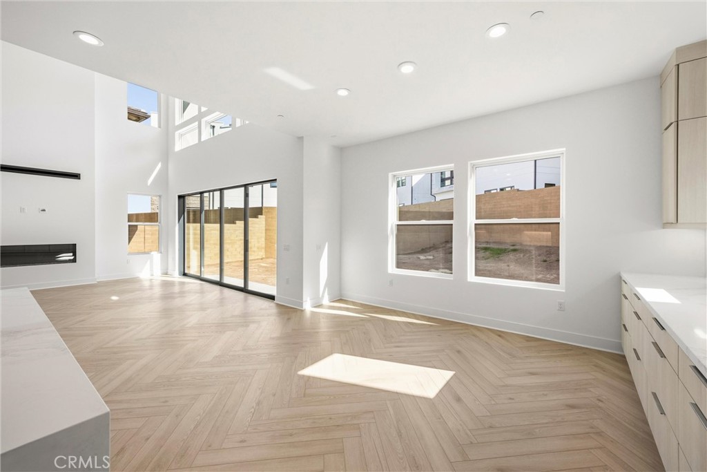 164 Apron Irvine, CA 92618 - Photo 20 of 67 a view of livingroom with hardwood floor and window