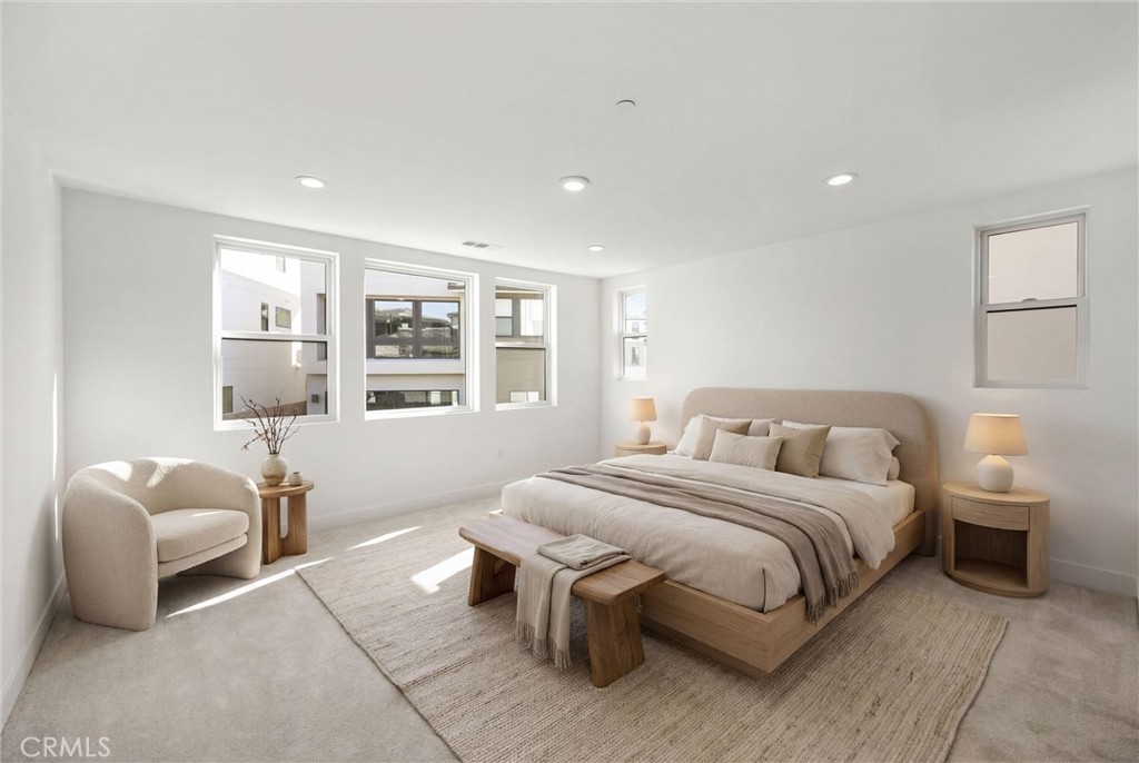 164 Apron Irvine, CA 92618 - Photo 26 of 67 a bedroom with a bed and a couch