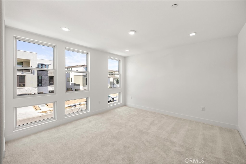 164 Apron Irvine, CA 92618 - Photo 37 of 67 wooden floor in an empty room with a window