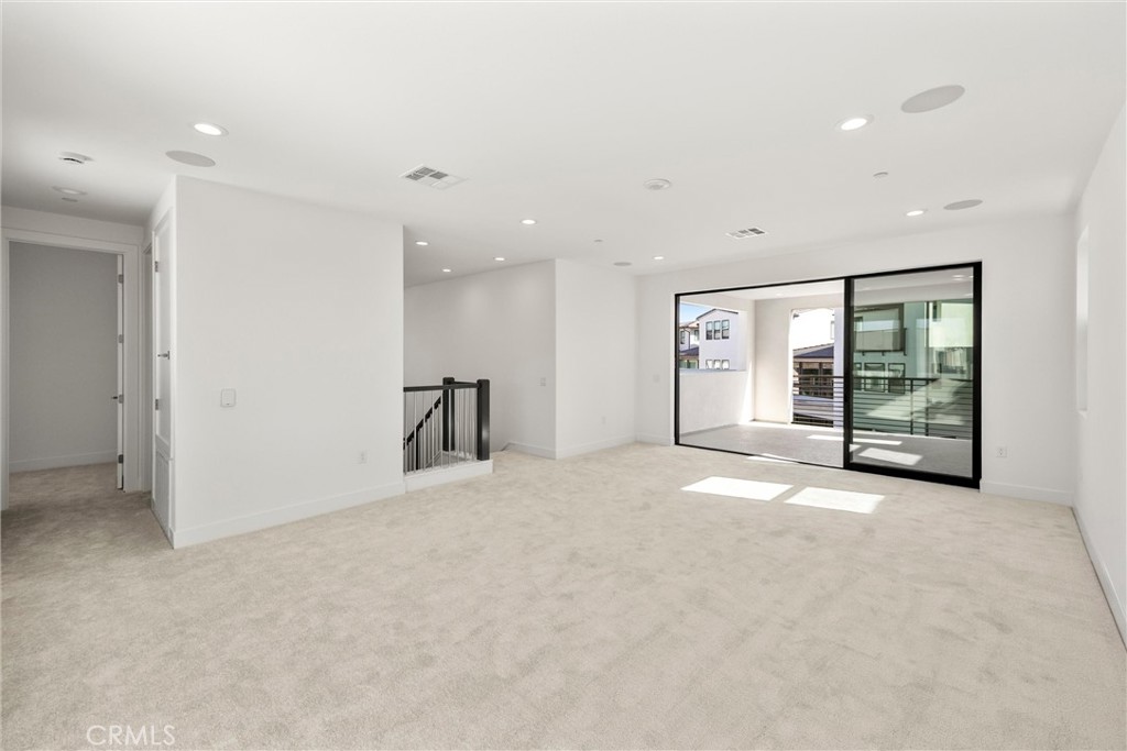 164 Apron Irvine, CA 92618 - Photo 43 of 67 a view of an empty room with a window