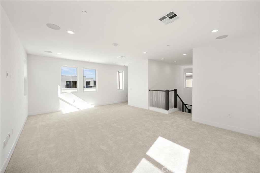 164 Apron Irvine, CA 92618 - Photo 44 of 67 a view of an empty room with a window