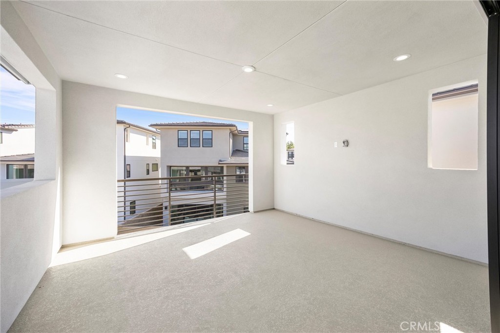 164 Apron Irvine, CA 92618 - Photo 46 of 67 a view of an empty room with a fireplace