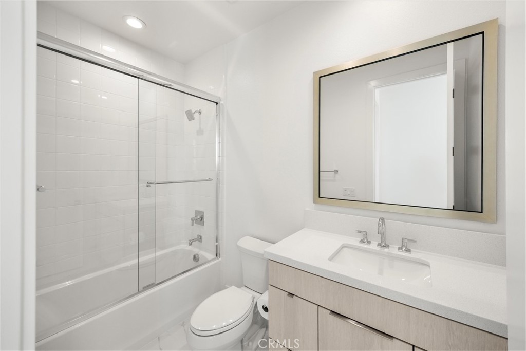 164 Apron Irvine, CA 92618 - Photo 50 of 67 a bathroom with a sink toilet and shower