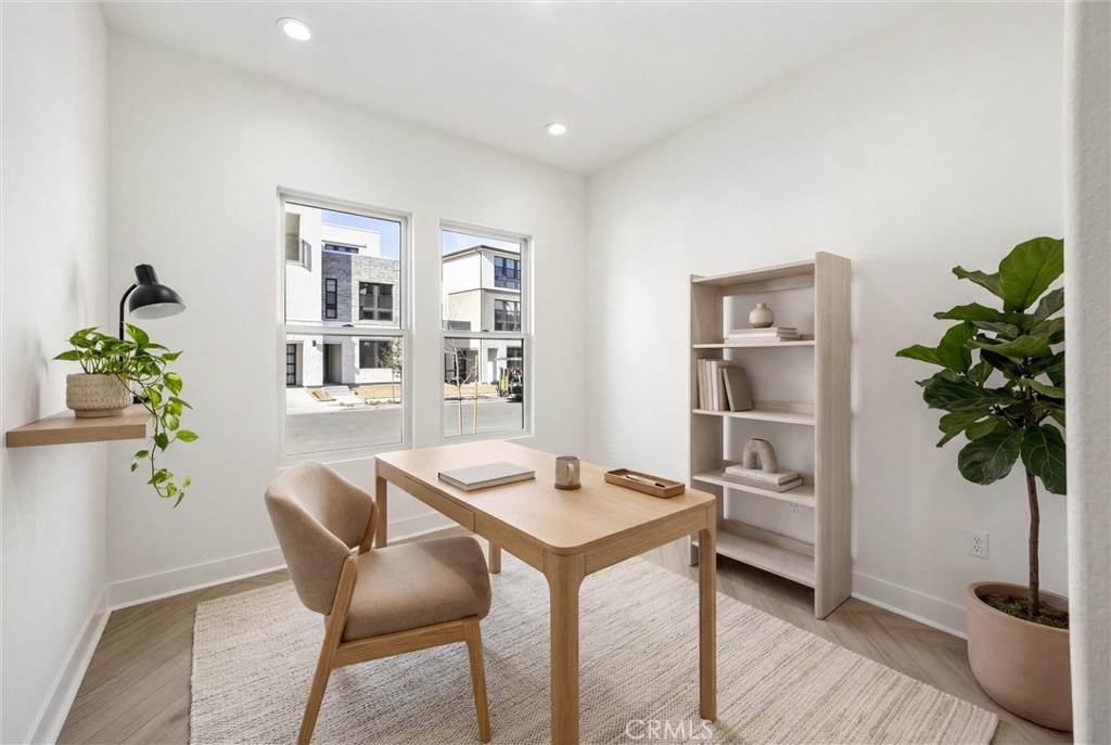 164 Apron Irvine, CA 92618 - Photo 8 of 67 a workspace with furniture and a potted plant
