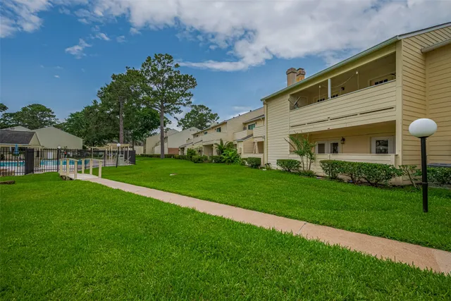 a view of a garden with an outdoor space
