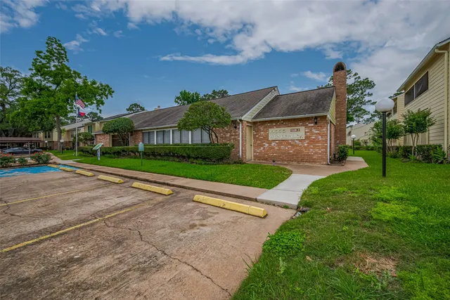 a view of a patio with swimming pool