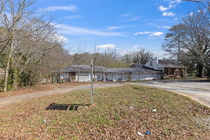 2076 Windy Hill Road Decatur, GA 30032 - Photo 10 of 20 a view of a yard with a house in the background