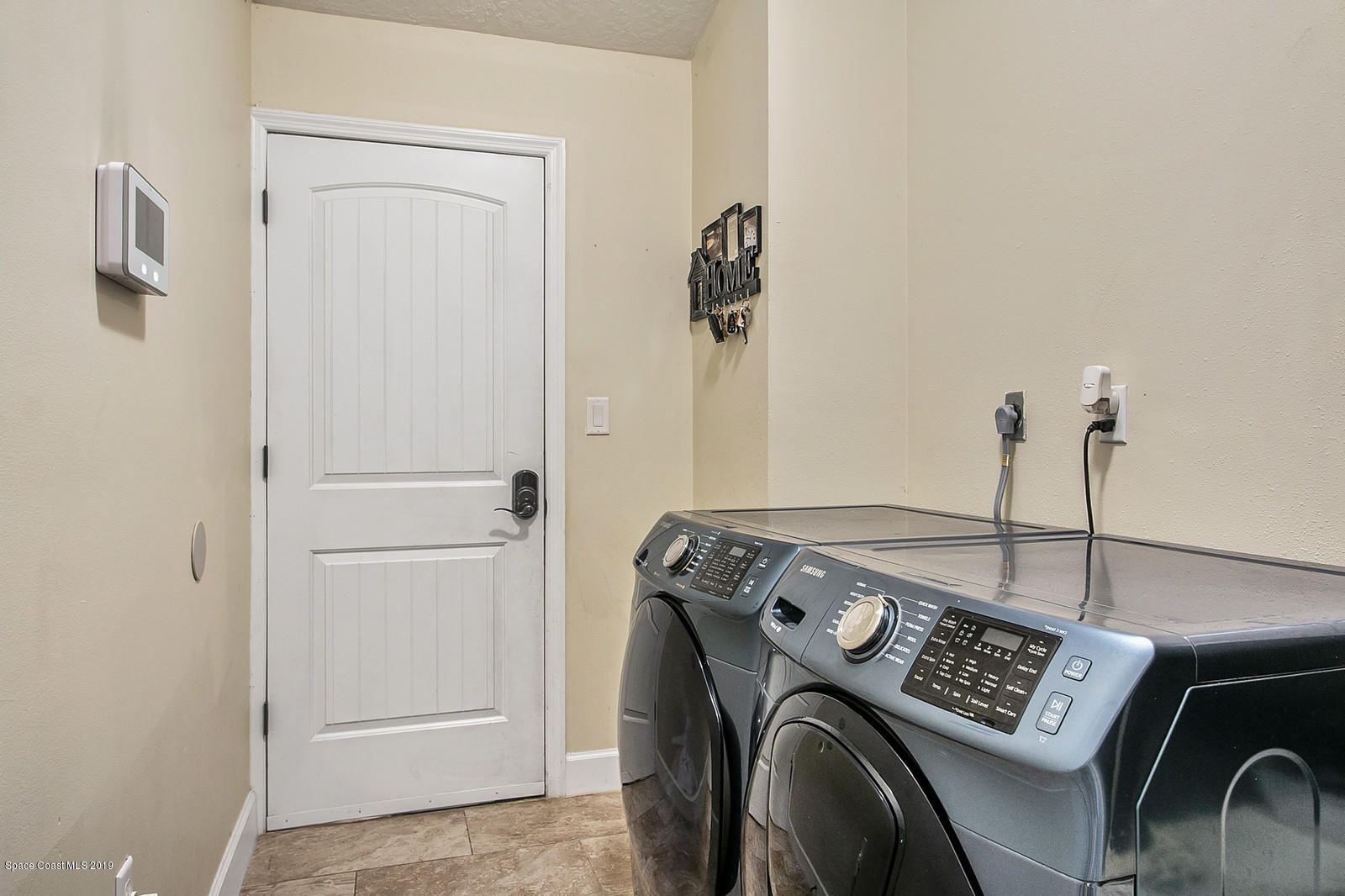 3435 Holly Springs Road Melbourne, FL 32934 - Photo 32 of 40 Indoor Laundry