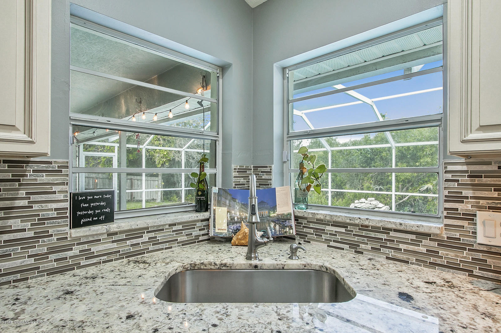 3435 Holly Springs Road Melbourne, FL 32934 - Photo 8 of 40 Overlook the Pool