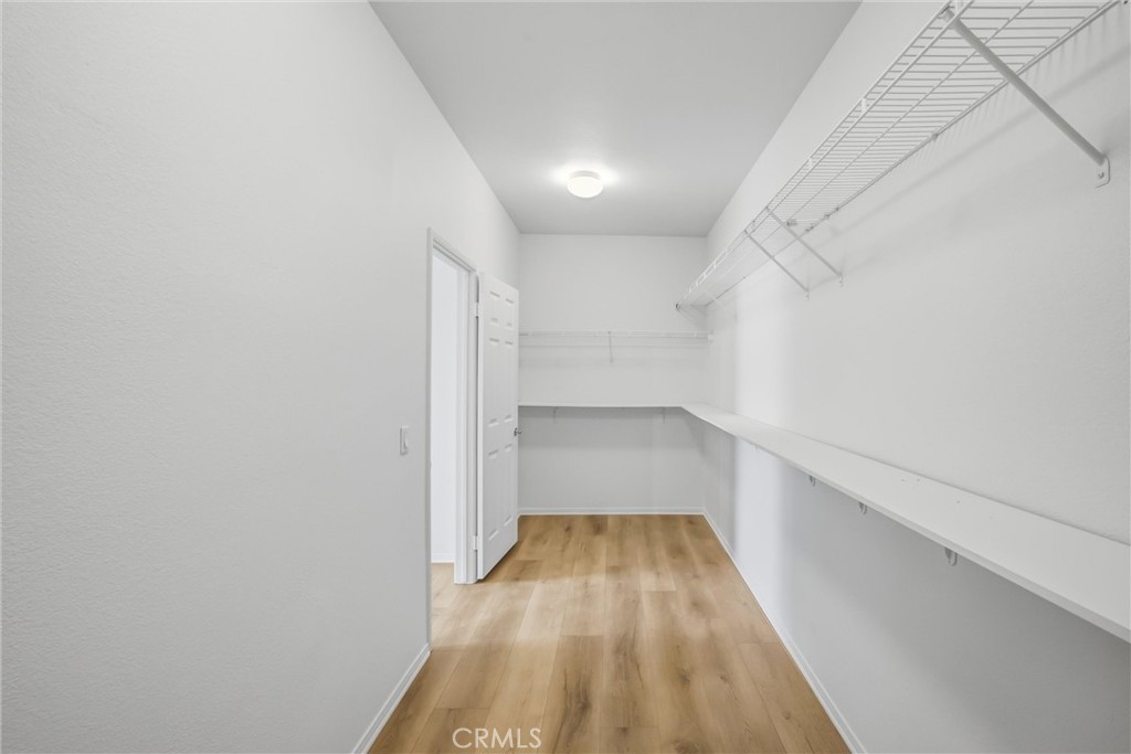 8710 Windmill Place Riverside, CA 92508 - Photo 47 of 66 a view of a room with wooden floor and staircase