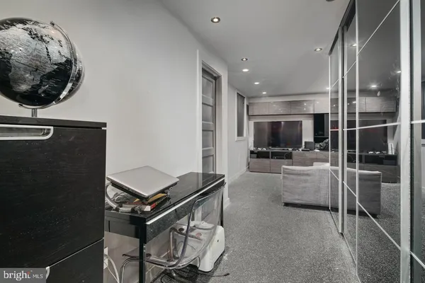 a living room with a couch and a table