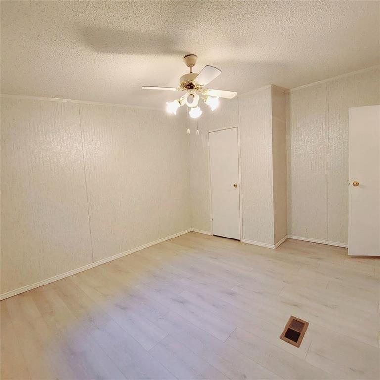 281 Mockingbird Drive Monticello, GA 31064 - Photo 25 of 42 a view of an empty room