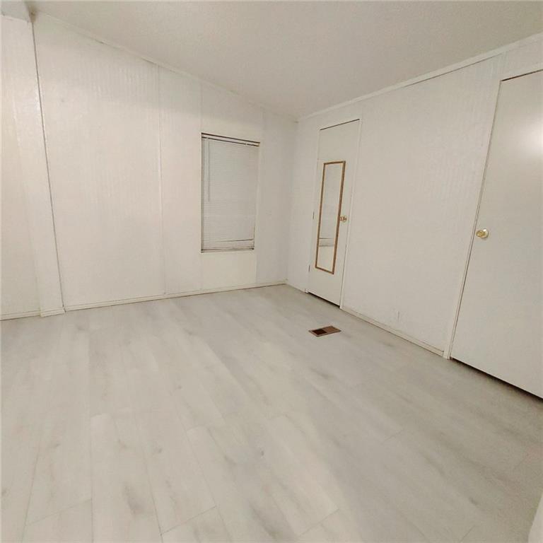 281 Mockingbird Drive Monticello, GA 31064 - Photo 27 of 42 an empty room with windows