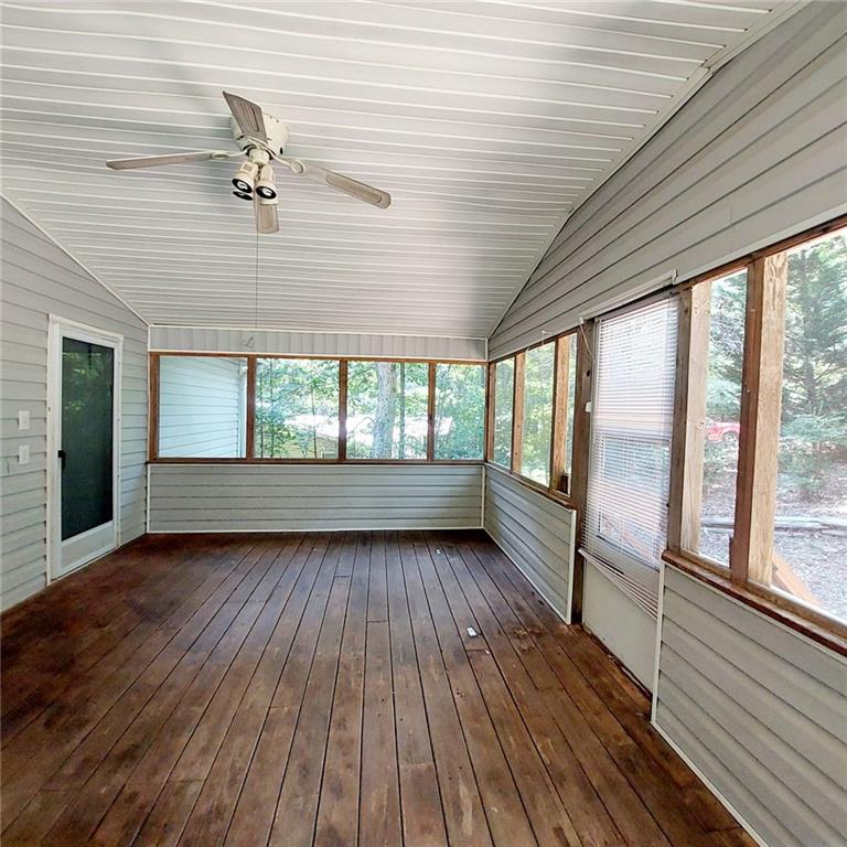 281 Mockingbird Drive Monticello, GA 31064 - Photo 5 of 42 a view of an empty room window and wooden floor