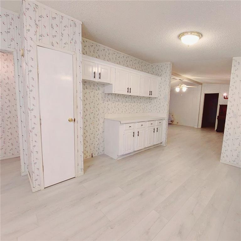 281 Mockingbird Drive Monticello, GA 31064 - Photo 9 of 42 a view of a kitchen with a sink