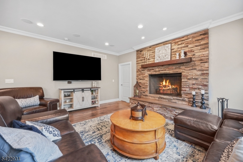 13 Fox Run Monroe Township, NJ 08831 - Photo 11 of 46 a living room with furniture and a flat screen tv