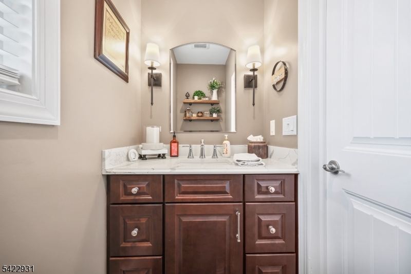 13 Fox Run Monroe Township, NJ 08831 - Photo 18 of 46 a bathroom with a sink and a mirror