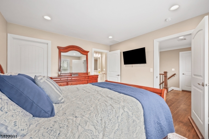 13 Fox Run Monroe Township, NJ 08831 - Photo 19 of 46 a bedroom with a bed and a large window