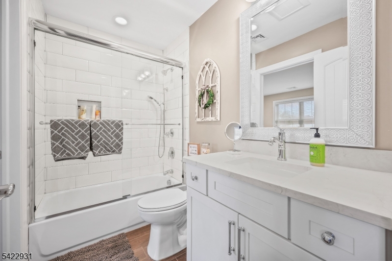13 Fox Run Monroe Township, NJ 08831 - Photo 21 of 46 a bathroom with a granite countertop sink mirror vanity and toilet