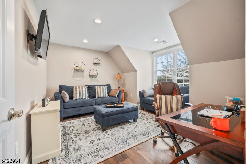 13 Fox Run Monroe Township, NJ 08831 - Photo 23 of 46 a living room with furniture and a flat screen tv